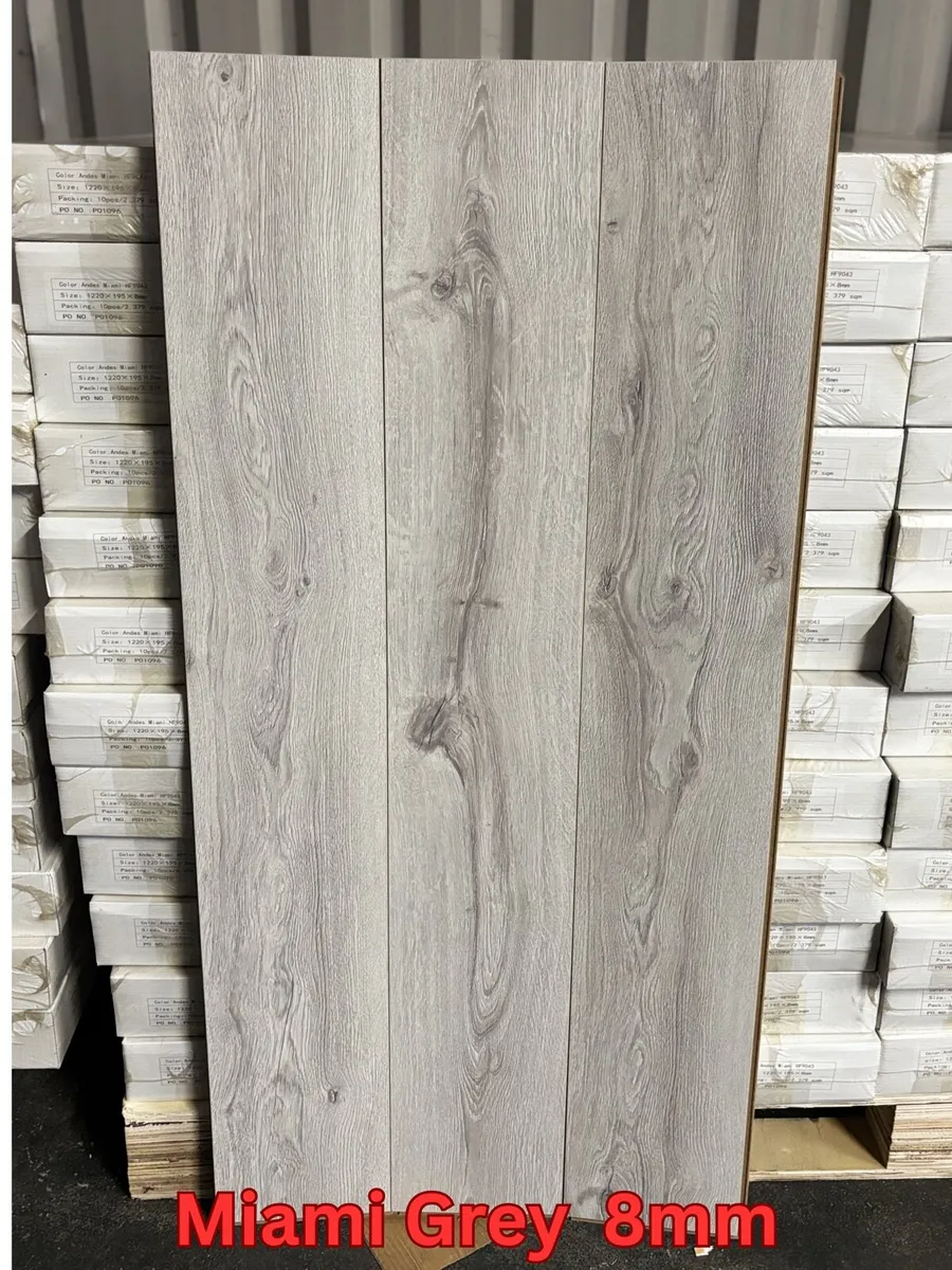 Grey Laminated Flooring 8mm and 12mm - Image 1