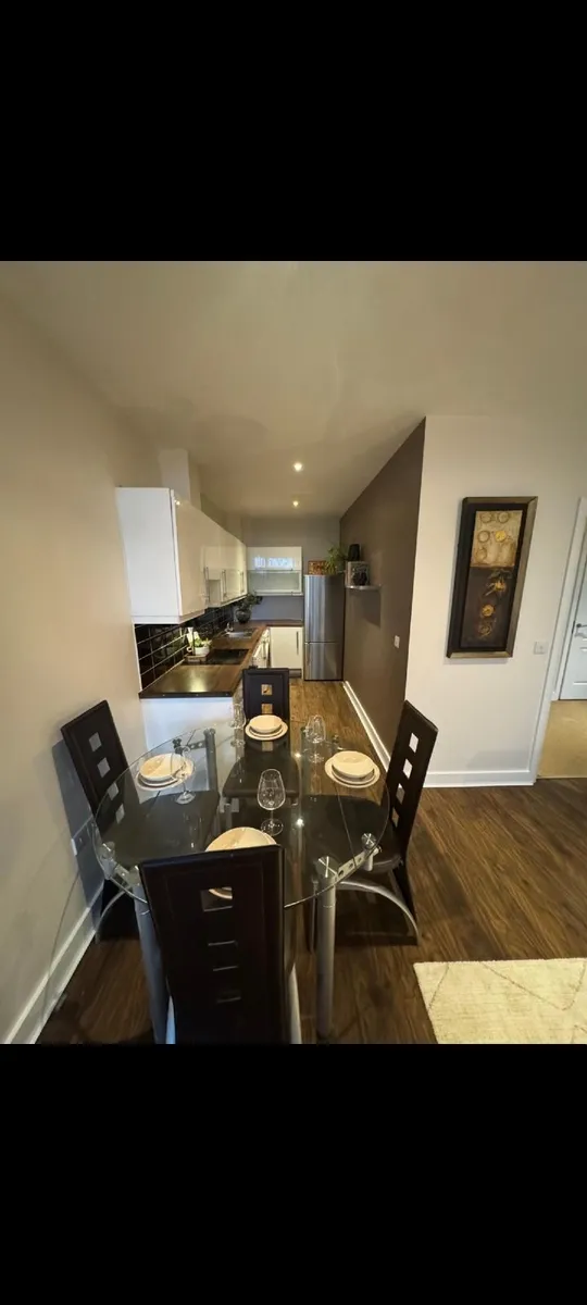 Glass dining table and 4 chairs