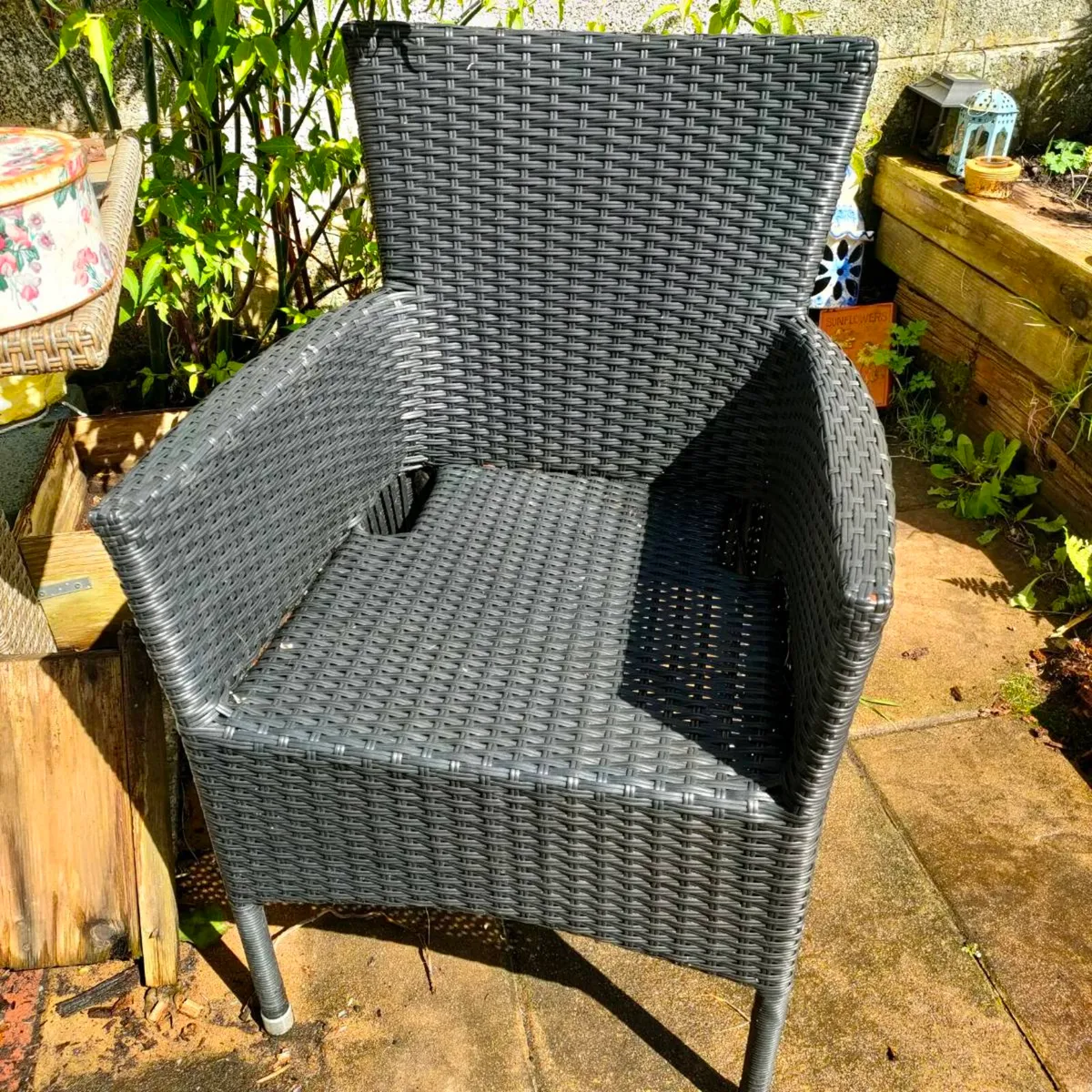 Black rattan garden chairs