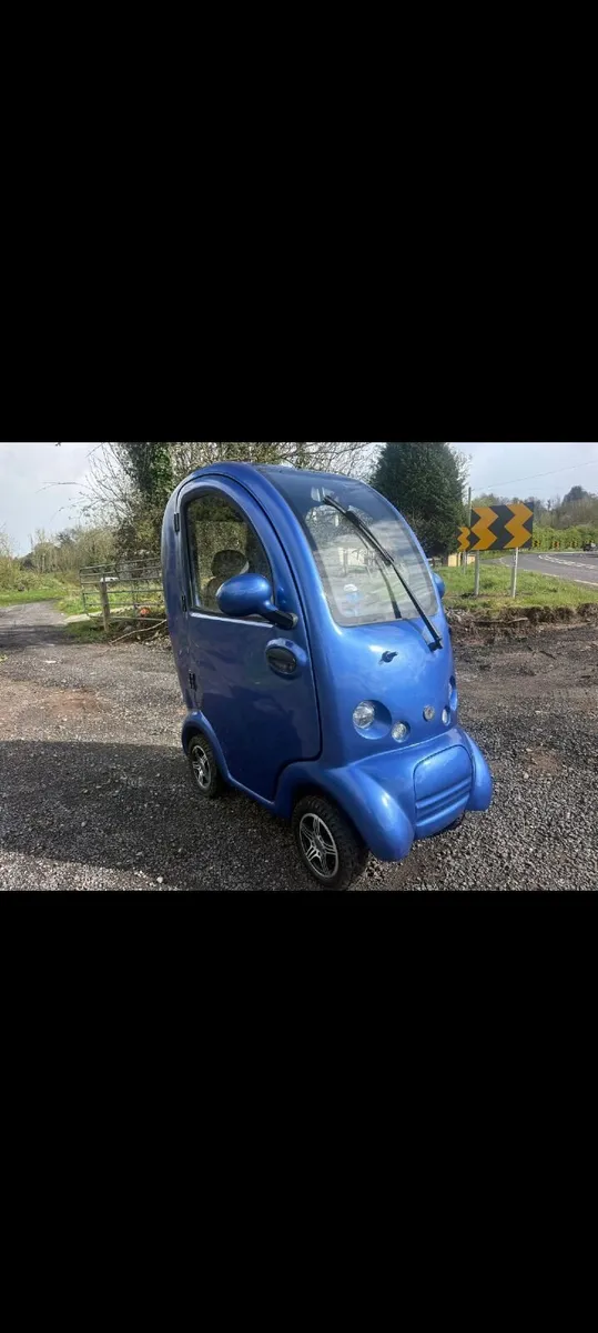 mobility scooter, cabin car - Image 1