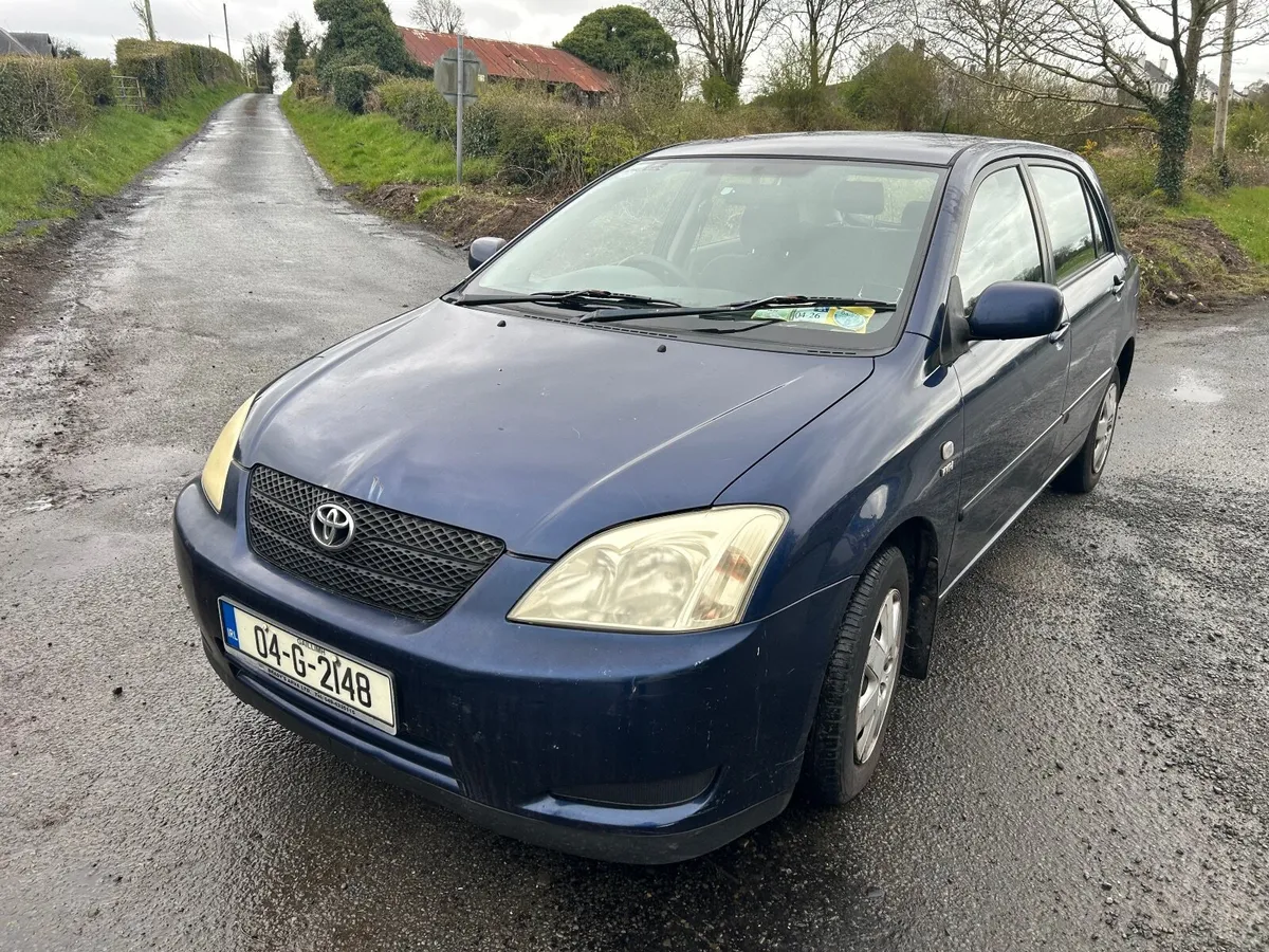 2004 Toyo corrolla and 2005 Nissan premera - Image 1