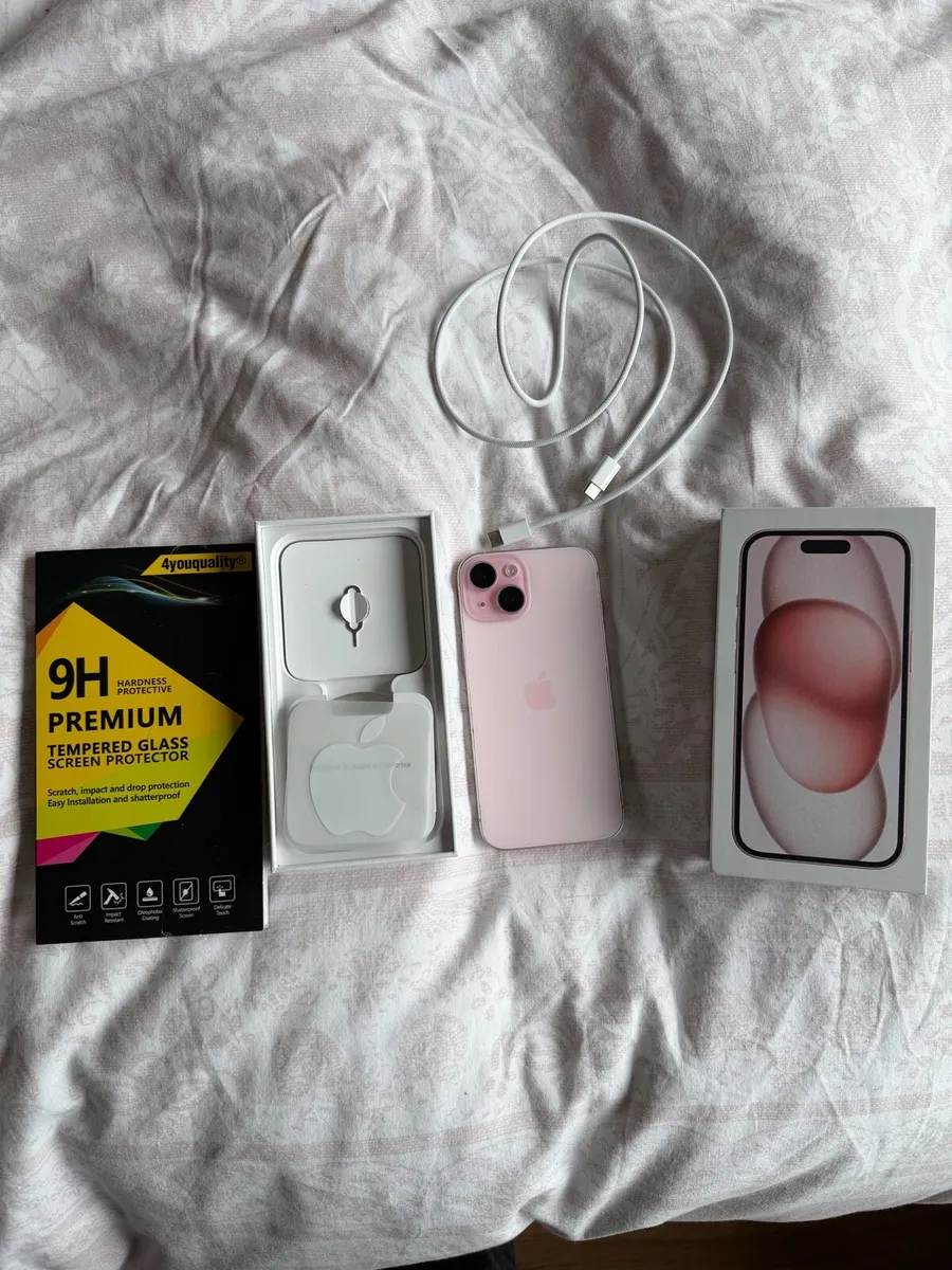 Pink iPhone 15 with box, charger and glass screen - Image 1