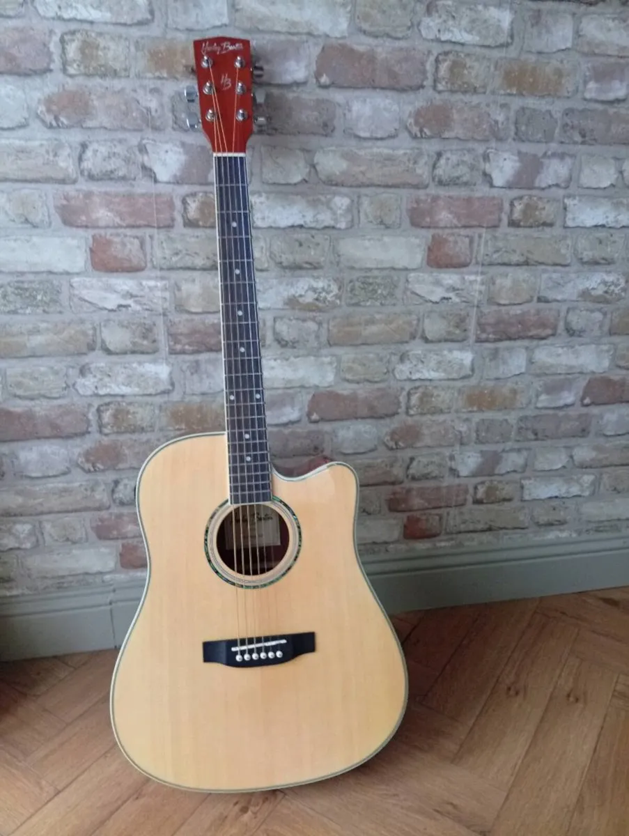 Acustic guitar - Image 1