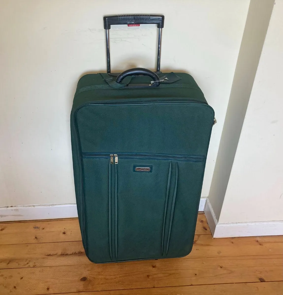 Large Luigi Rossi Green Rolling Suitcase - Image 1