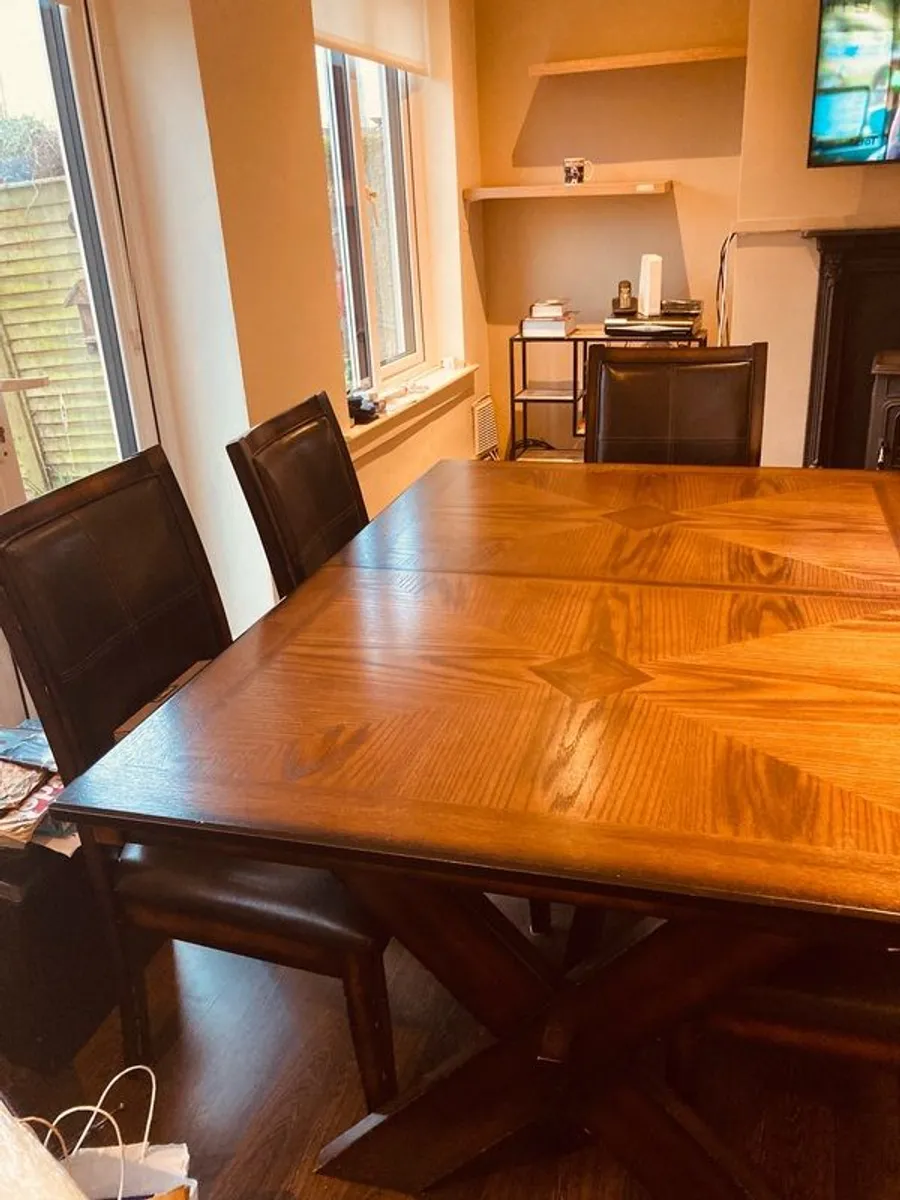 Stunning Solid Mahogany Extendable Dining Suite and Matching Coffee Table looking for a new home. - Image 1