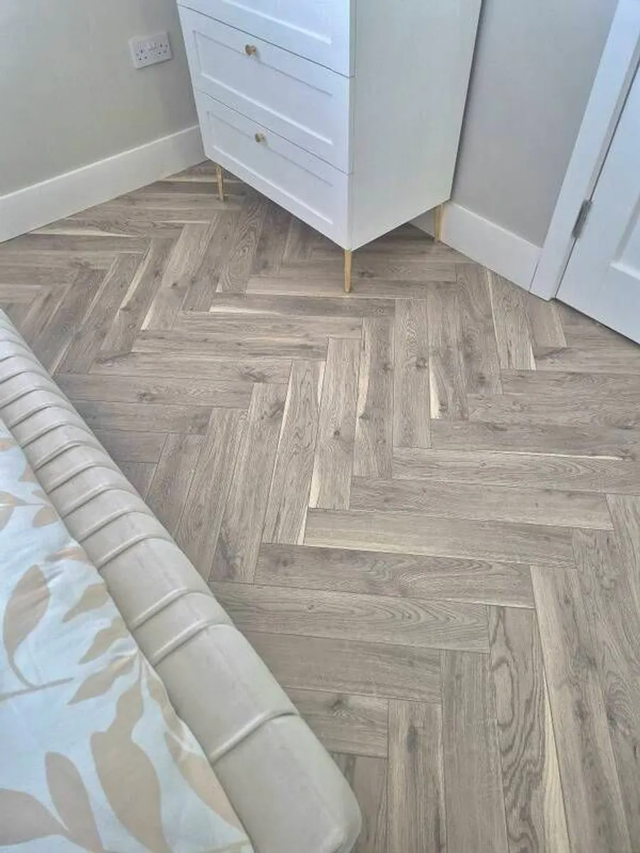 12mm herringbone laminate flooring - Image 1