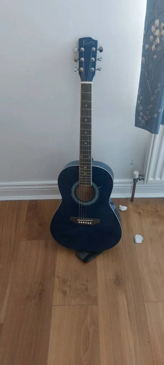 Acoustic Guitar - Image 1