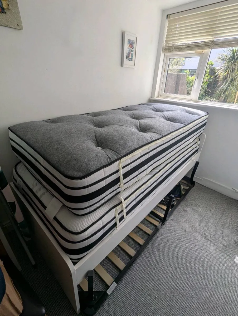 As new 2 single mattresses zip link. ex frames - Image 1