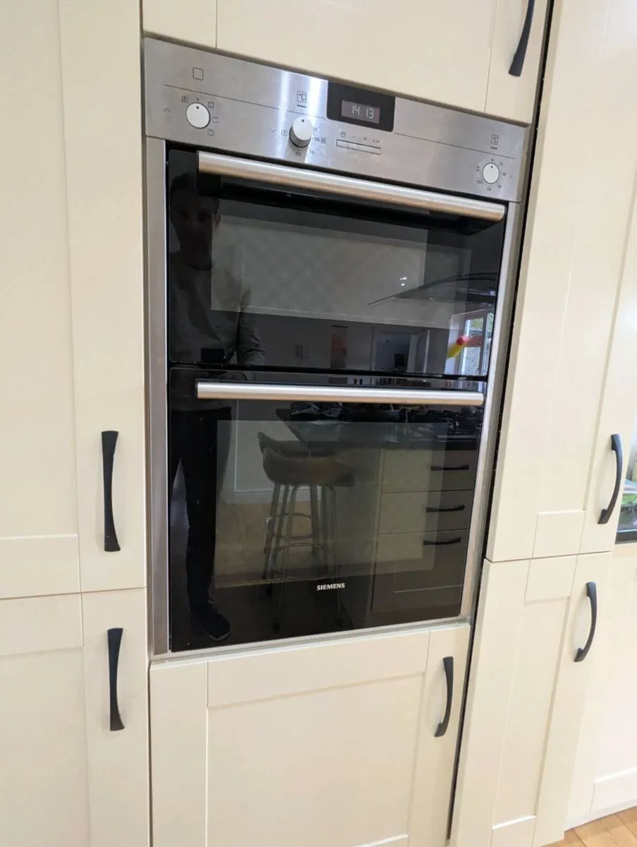 Cream kitchen cabinets & Quartz black countertop - Image 3