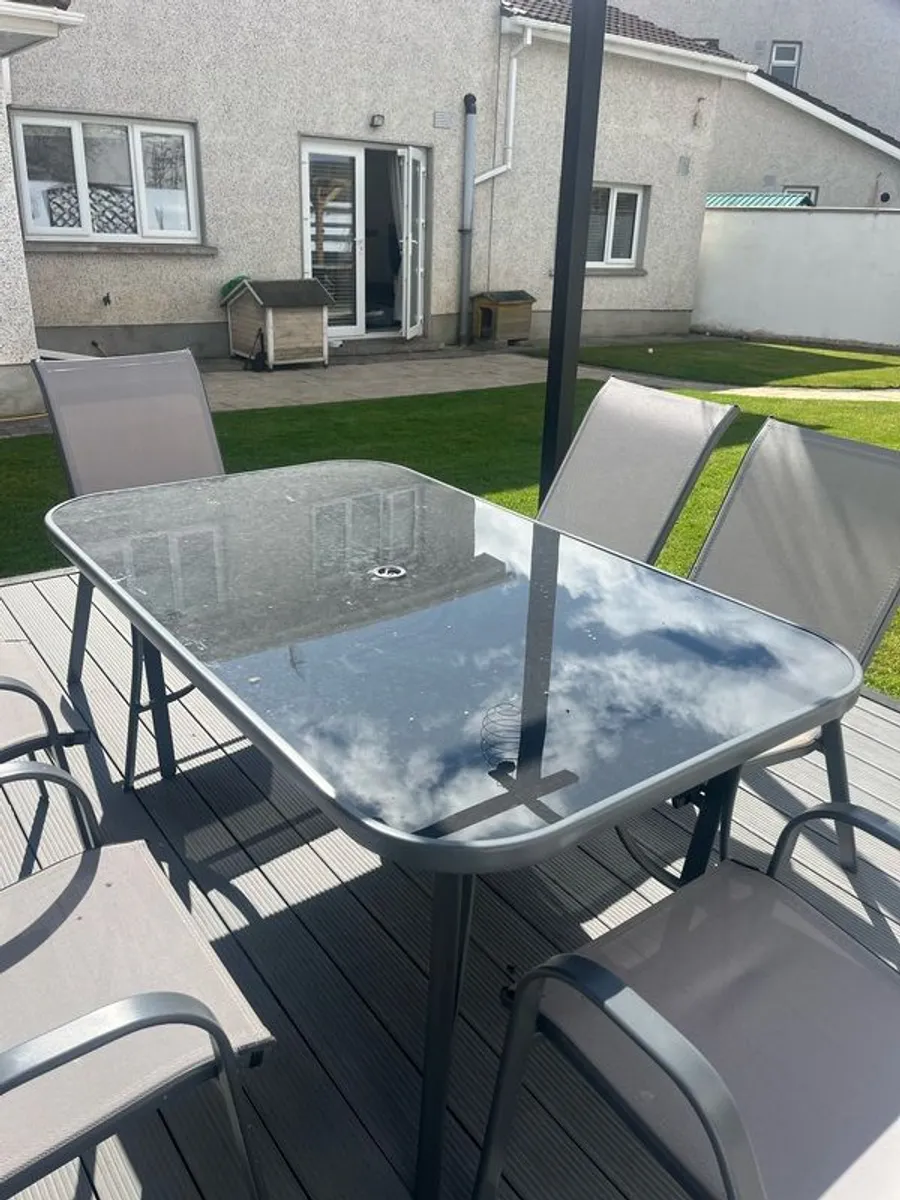 garden table and chairs - Image 1