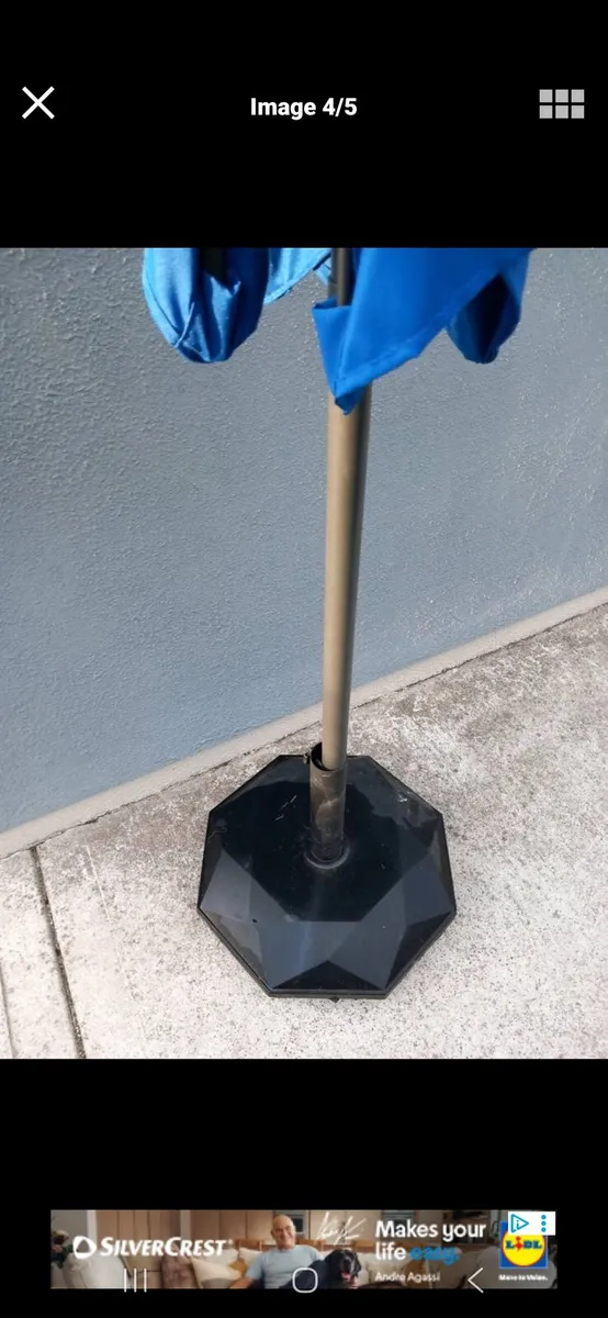 Blue parasol and concrete base - Image 3