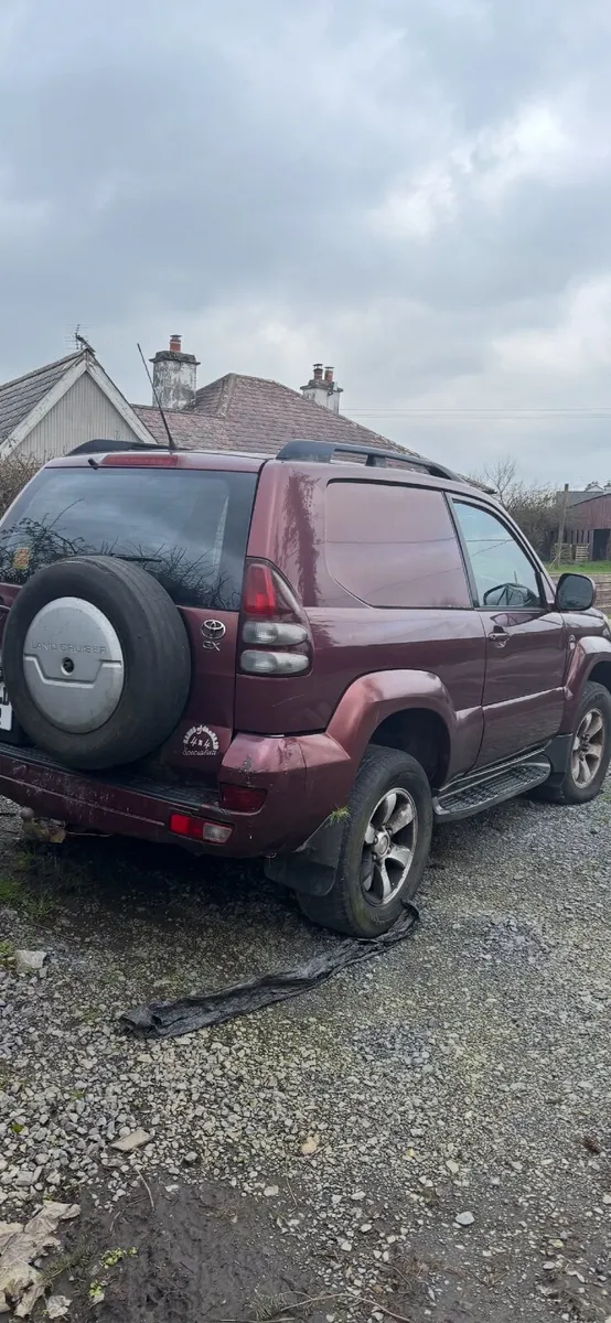 03 Wine Toyota Land Cruiser - Image 2