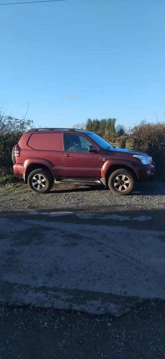 03 Wine Toyota Land Cruiser - Image 1