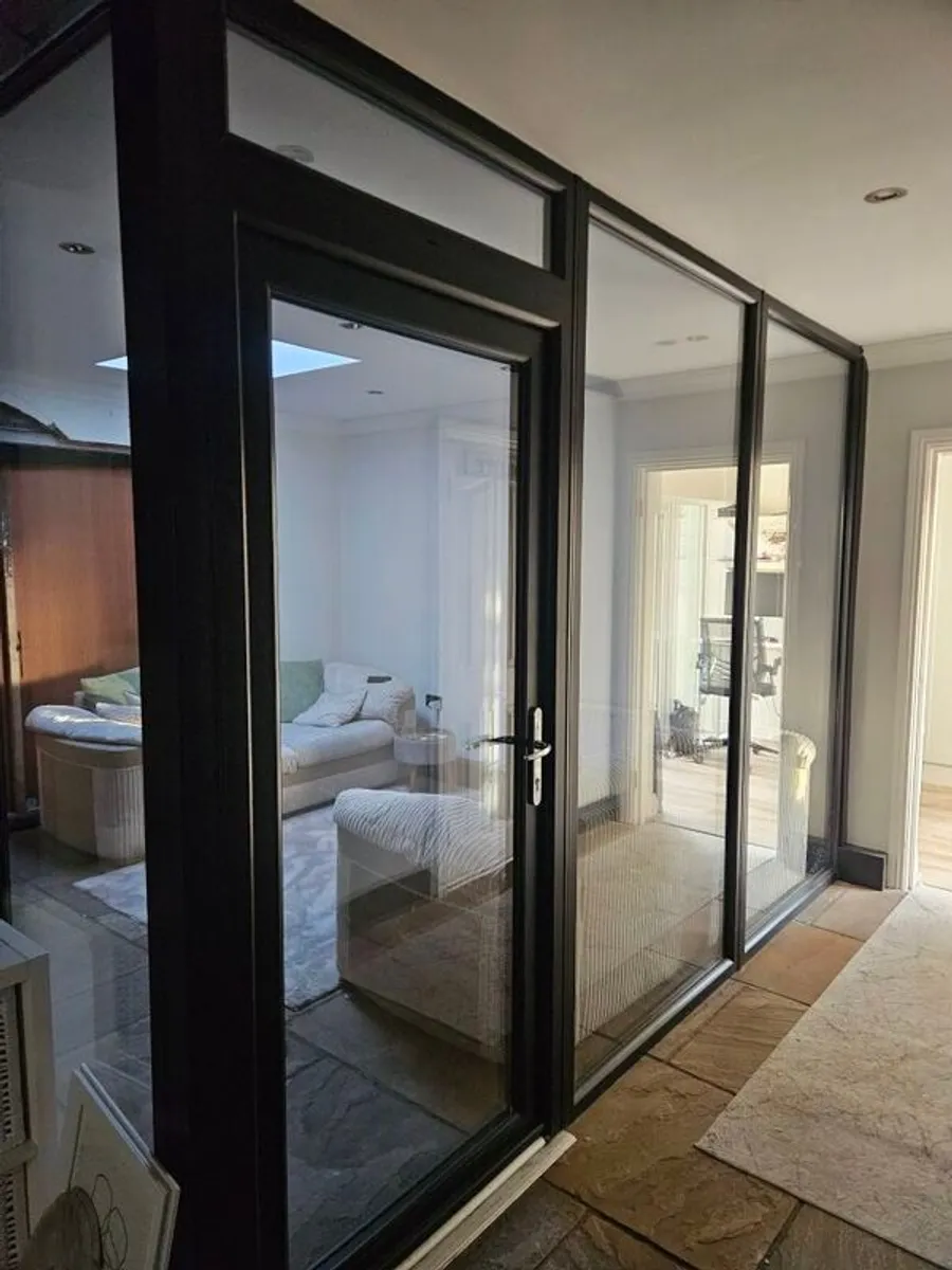 PVC door and glass panels - Image 1