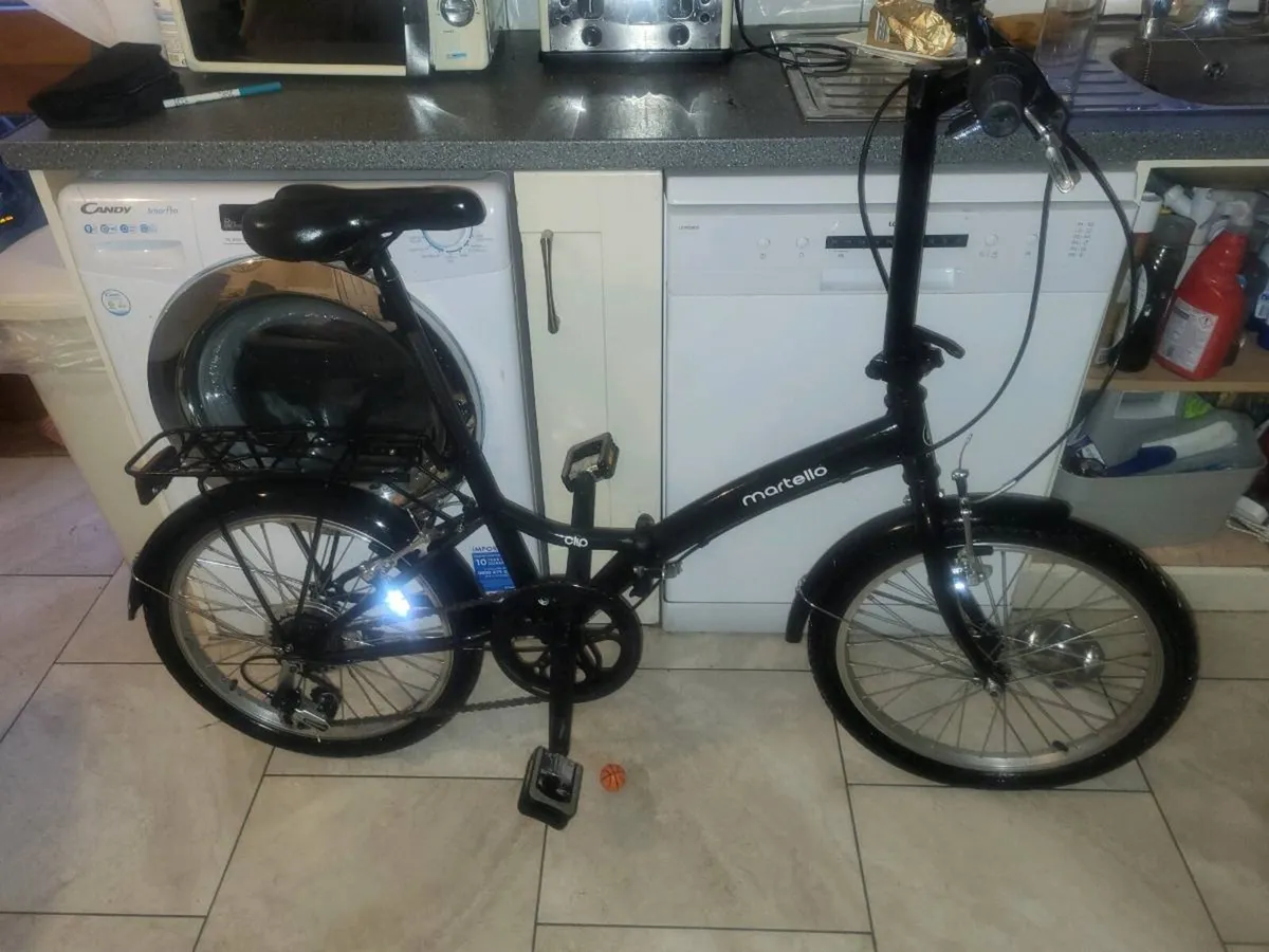 Fold up bike - Image 1