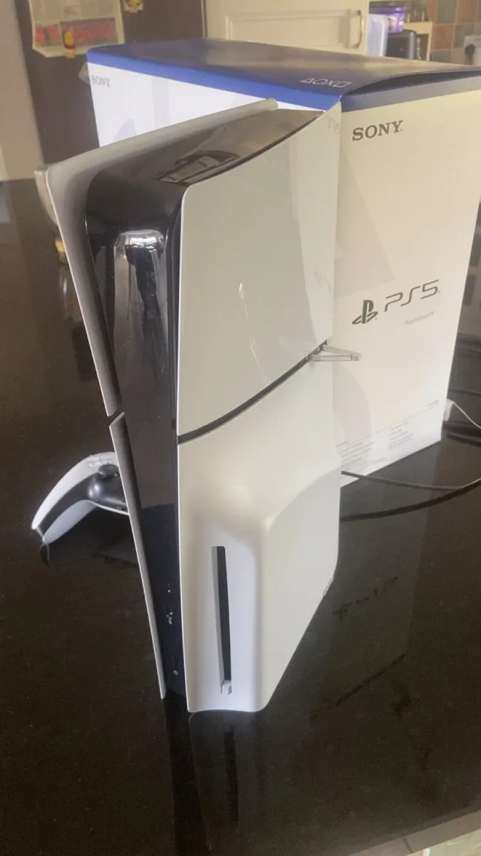 PlayStation 5 with controller and BO6 - Image 2