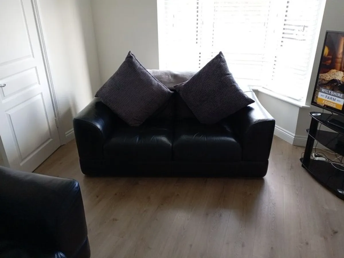 3 seater and 2 seater black leather sofas for sale - Image 1