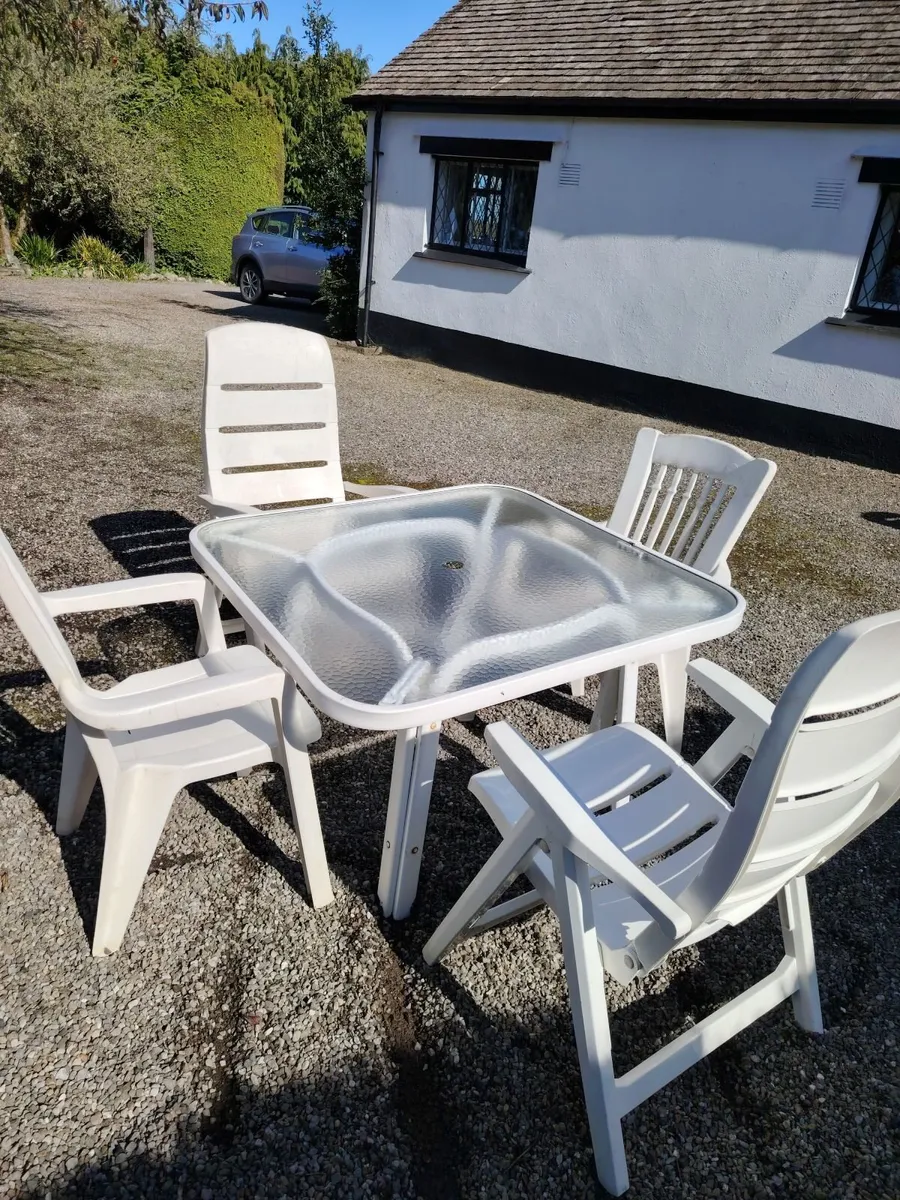Patio table and chairs - Image 1