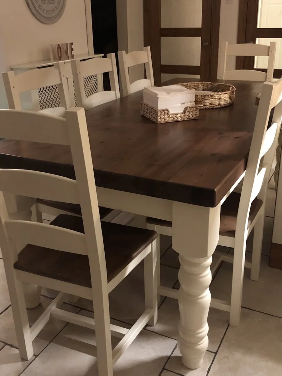 Dining table with 6 chairs and dresser