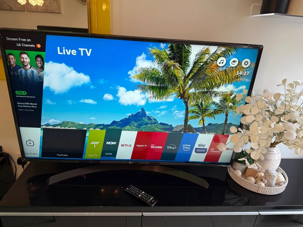 LG 49” SMART 4K ULTRA HD TV in swords - Image 1