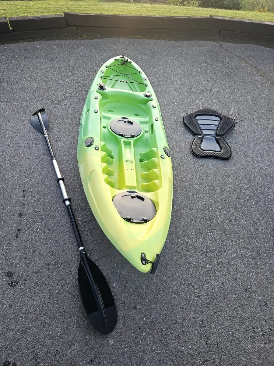 Sea Kayak with seat and oar - Image 1