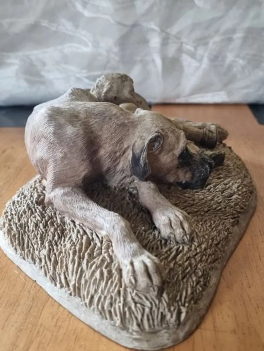 Sculpture of a boy sleeping with a dog - Image 3