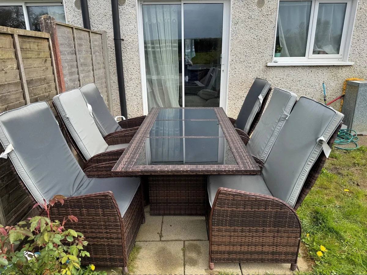 Outdoor Rattan Table and Reclining Chairs - Image 1