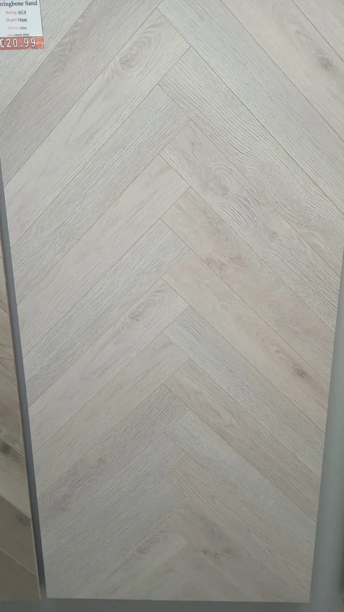 Brand new herringbone flooring - Image 1