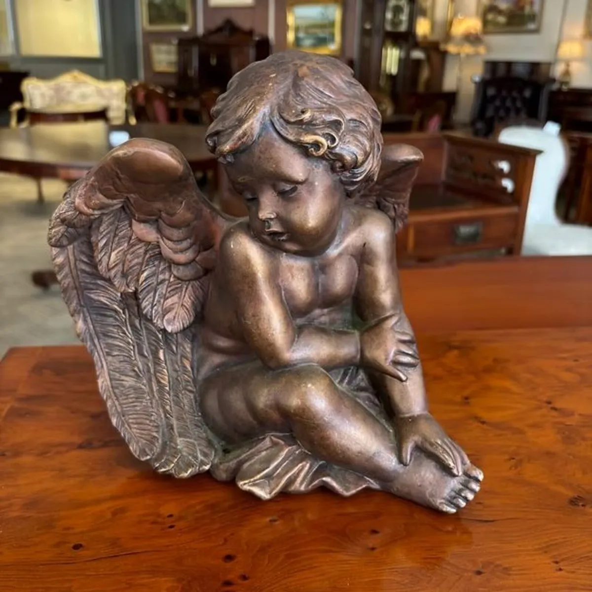Bronze-tone resin sitting angel garden figurine