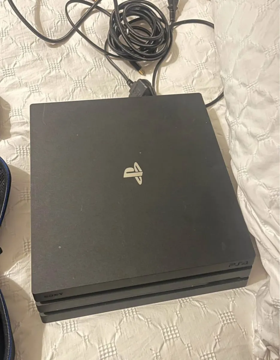 PS4 Pro + 2 Controllers - Image 1