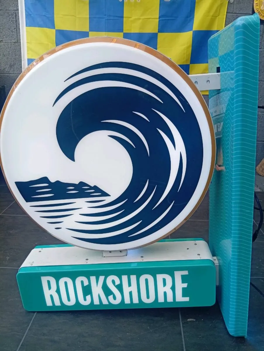 Rockshore projection light sign