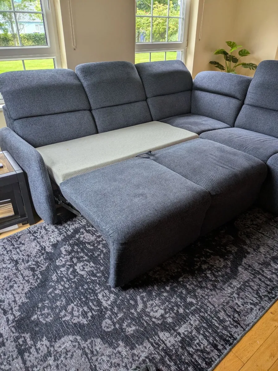 L shape corner couch with pull out bed and storage - Image 2