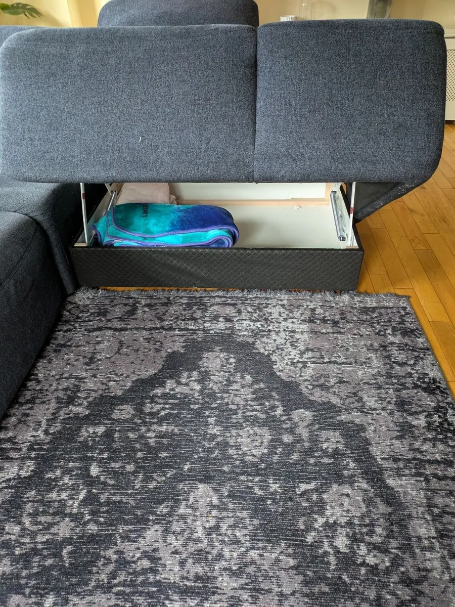 L shape corner couch with pull out bed and storage - Image 4