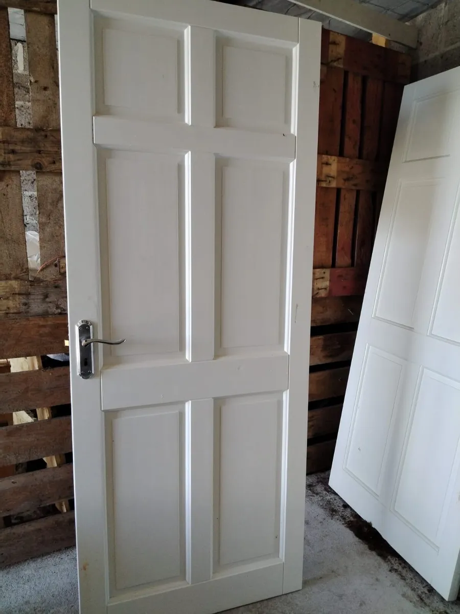 Panel doors with hinges locks and handles