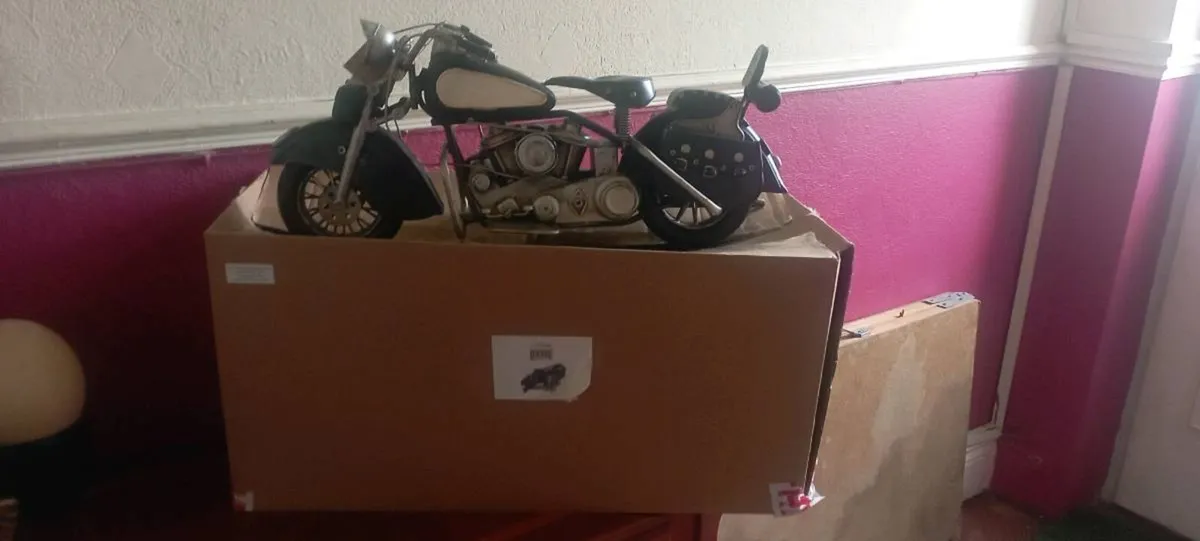 VINTAGE STEEL MOTORCYCLE OVER 21 INCH IN LENGTH . - Image 1