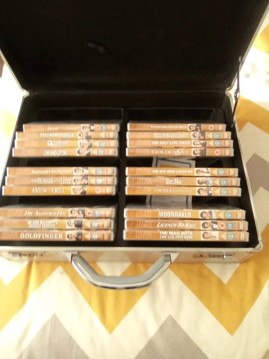 NEW.  20.   JAMES. BOND. D.V.D.S.  AND.  CASE - Image 1