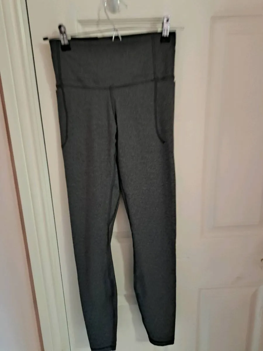 Under Armour grey fitted leggings - Image 1