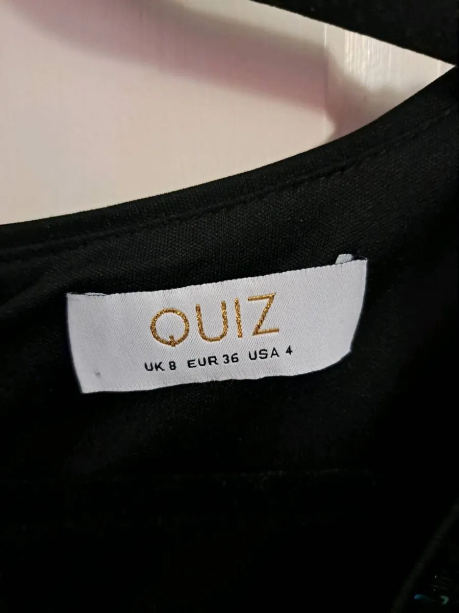 Quiz sequin dress
Midi length - Image 3