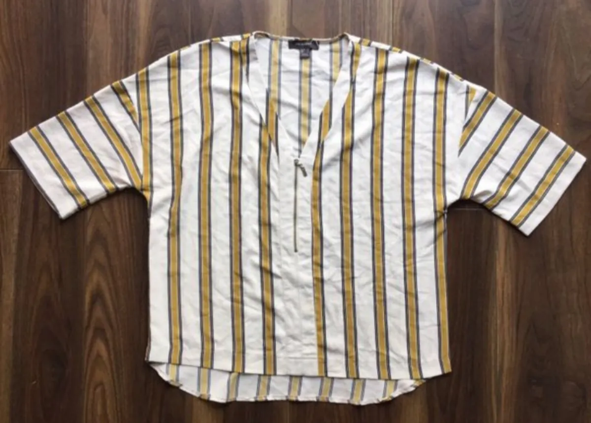 Women's V-neck blouse featuring a vertical striped - Image 2