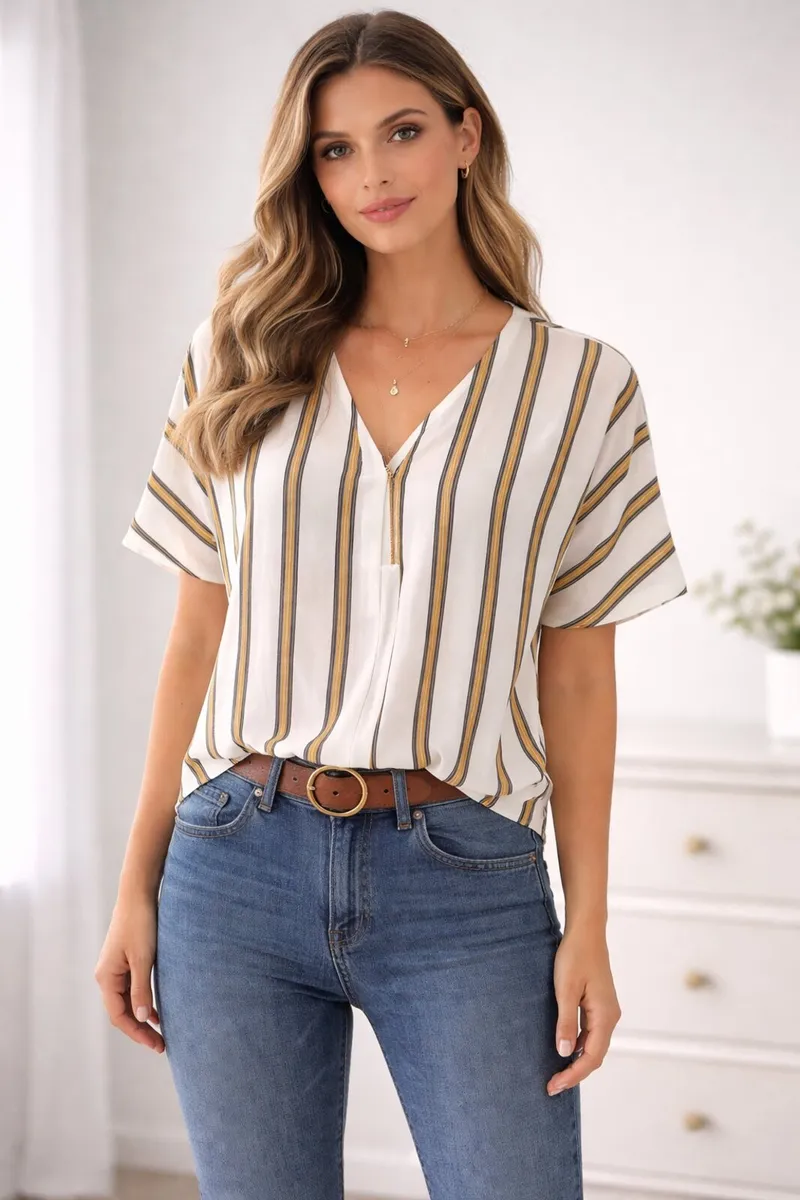 Women's V-neck blouse featuring a vertical striped - Image 1