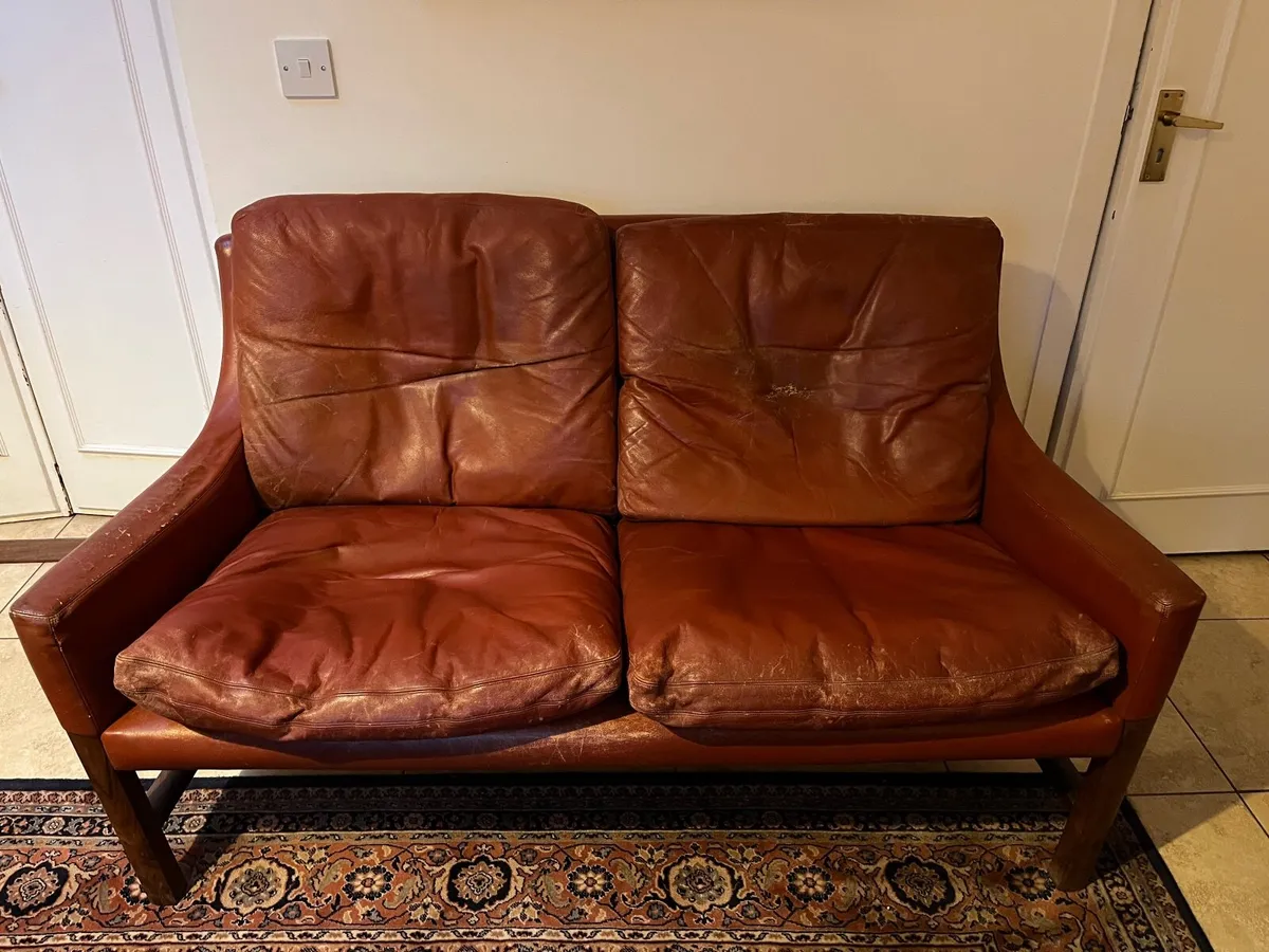 Red leather vintage two seater couch