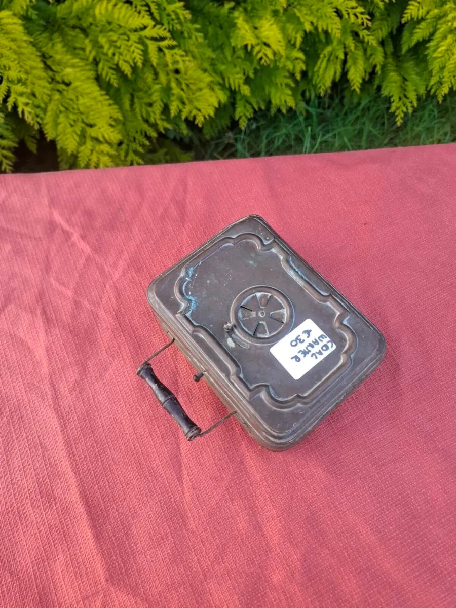 Antique feet warmer possible to post