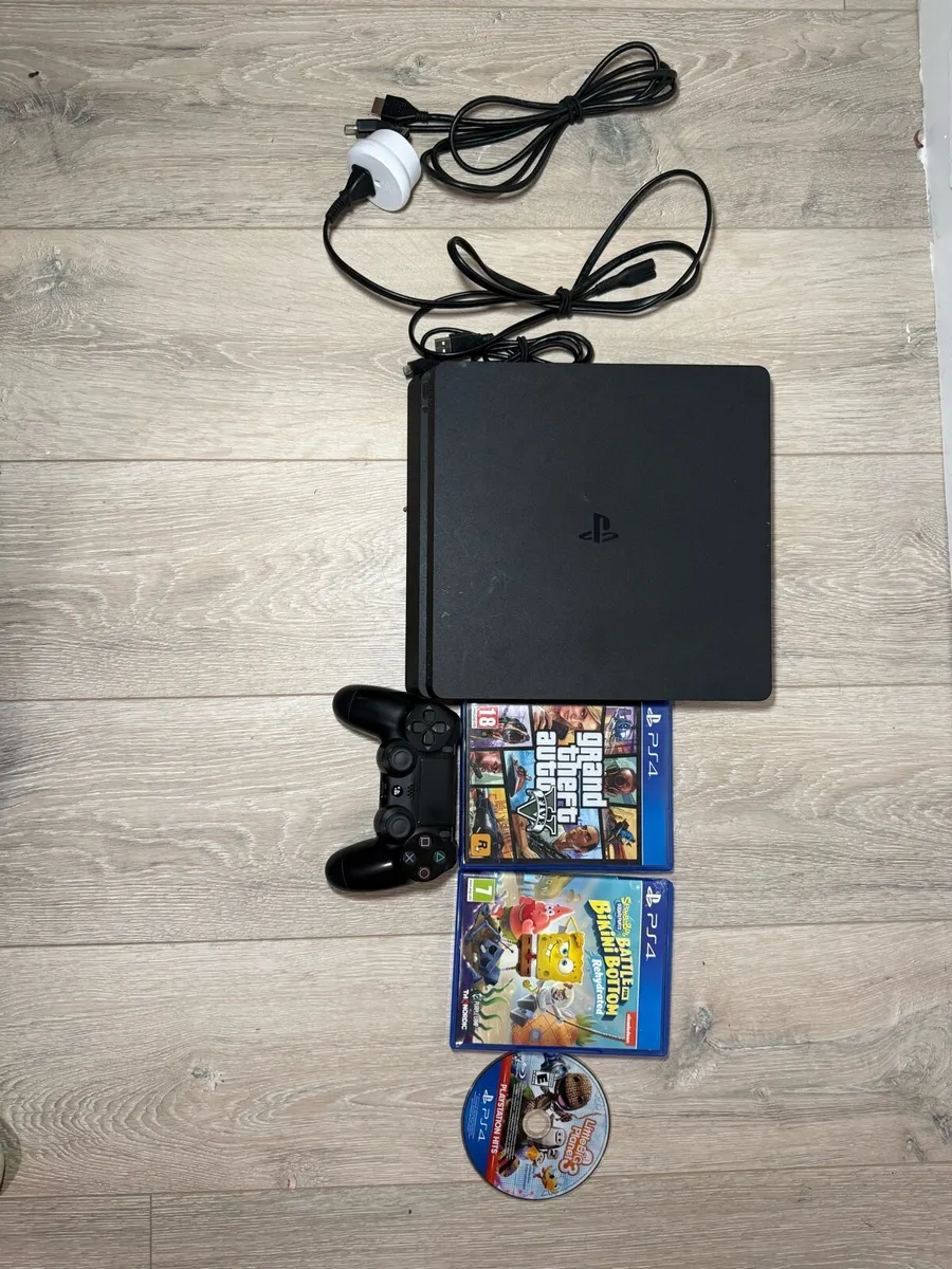 PS4slim 1TB comes with games & all attachments - Image 1