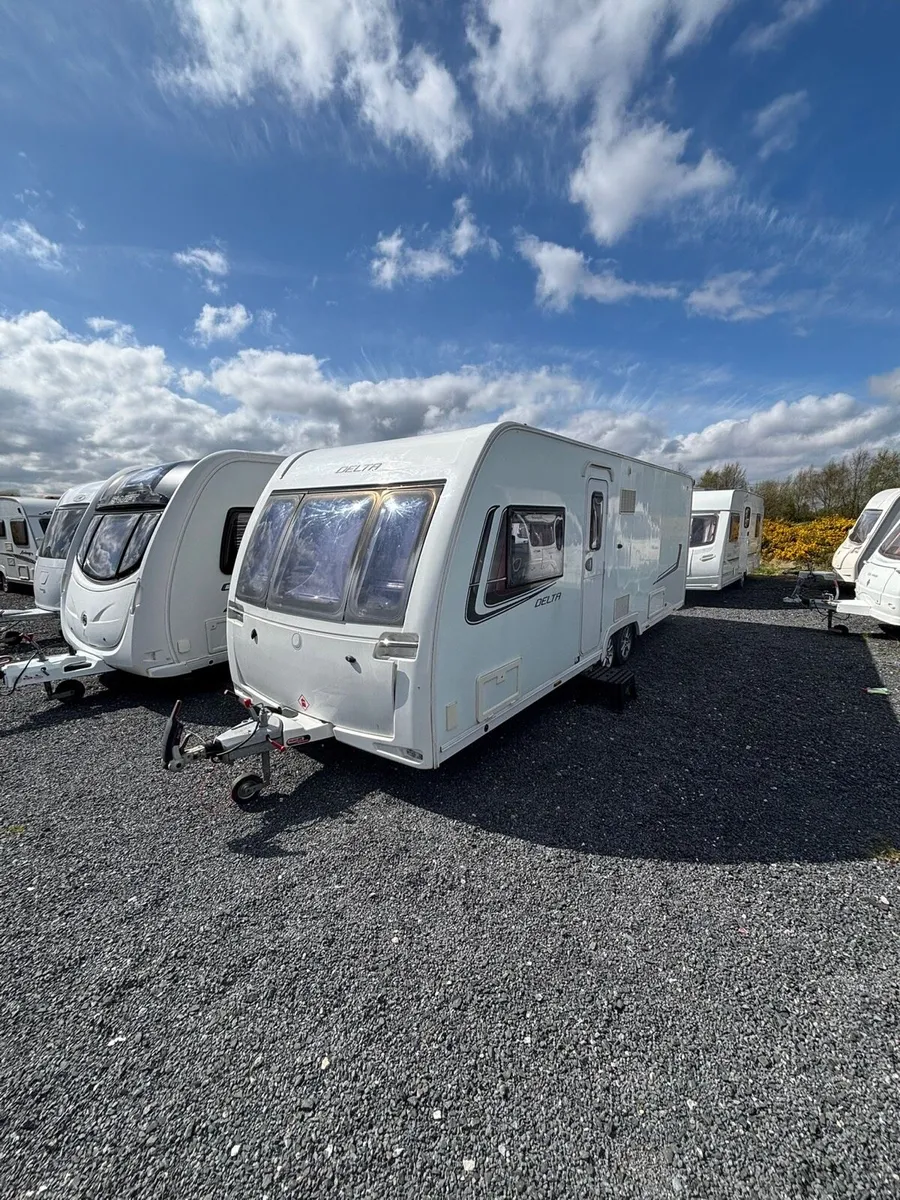 2014 Lunar 4 Berth Fixed Island Bed Caravan - Image 1