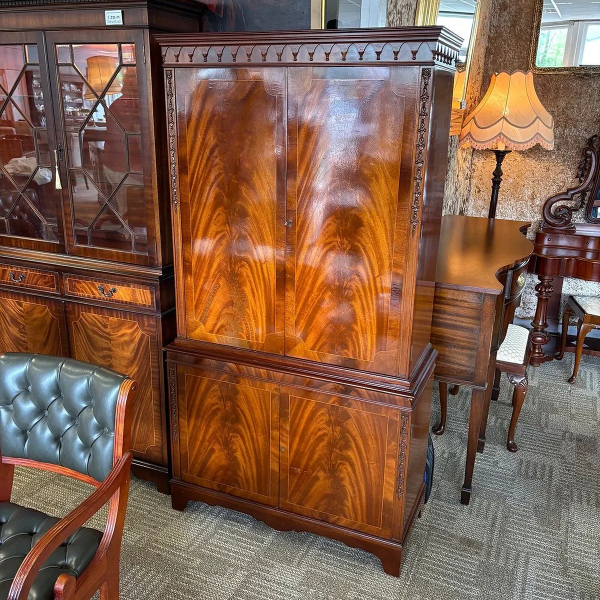 19th century style mahogany flamed drinks cabinet.