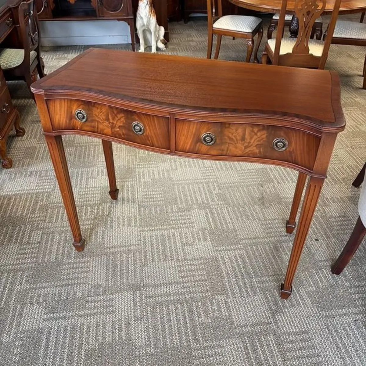 Fabulous mahogany flamed bow fronted console table