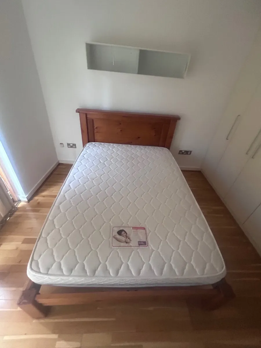 Wooden frame double bed - Image 1