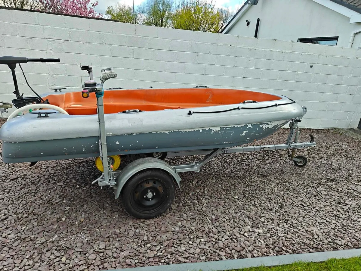Rigiflex 370 boat with trailer + electric motor - Image 1