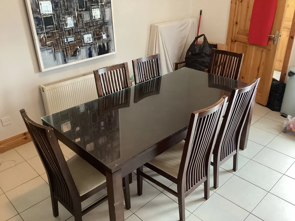 Table with glass top and 6 chairs