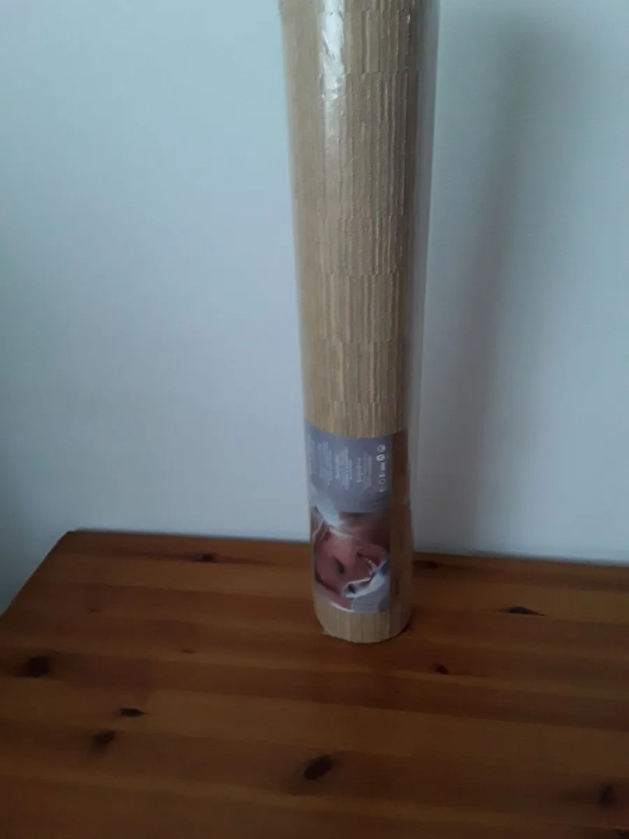 One roll of heavy quality wallpaper tanned colour